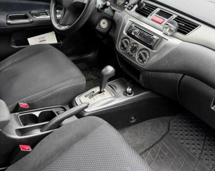 Чорний Міцубісі Lancer, об'ємом двигуна 1.6 л та пробігом 245 тис. км за 4500 $, фото 22 на Automoto.ua