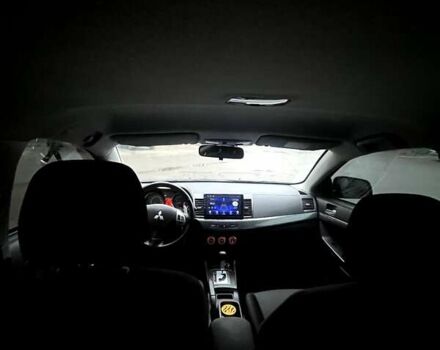 Черный Мицубиси Лансер, объемом двигателя 2 л и пробегом 217 тыс. км за 7000 $, фото 1 на Automoto.ua