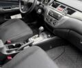 Чорний Міцубісі Lancer, об'ємом двигуна 1.6 л та пробігом 245 тис. км за 4500 $, фото 22 на Automoto.ua