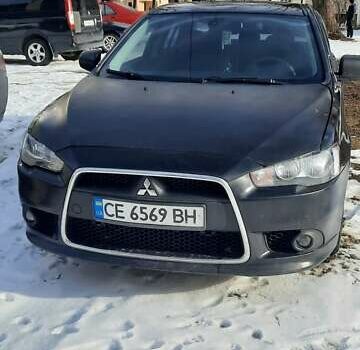 Чорний Міцубісі Lancer, об'ємом двигуна 2 л та пробігом 228 тис. км за 5500 $, фото 1 на Automoto.ua