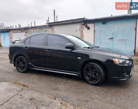 Чорний Міцубісі Lancer, об'ємом двигуна 2 л та пробігом 210 тис. км за 7100 $, фото 2 на Automoto.ua