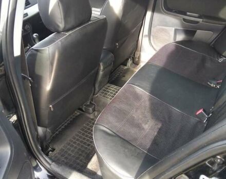 Черный Мицубиси Лансер, объемом двигателя 1.5 л и пробегом 219 тыс. км за 6000 $, фото 3 на Automoto.ua