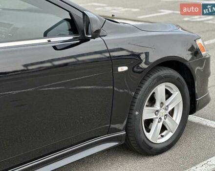 Чорний Міцубісі Lancer, об'ємом двигуна 2 л та пробігом 199 тис. км за 7900 $, фото 5 на Automoto.ua