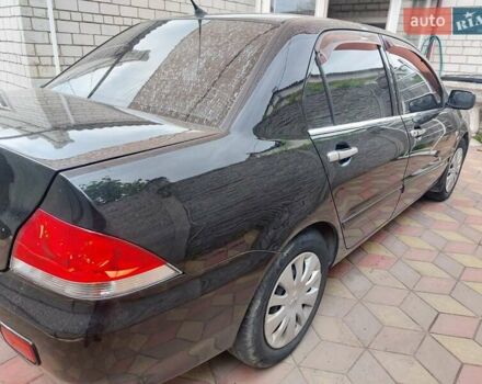 Чорний Міцубісі Lancer, об'ємом двигуна 1.6 л та пробігом 215 тис. км за 4900 $, фото 5 на Automoto.ua