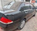 Чорний Міцубісі Lancer, об'ємом двигуна 1.6 л та пробігом 215 тис. км за 4900 $, фото 5 на Automoto.ua