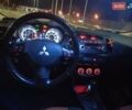 Черный Мицубиси Лансер, объемом двигателя 2 л и пробегом 240 тыс. км за 6400 $, фото 16 на Automoto.ua