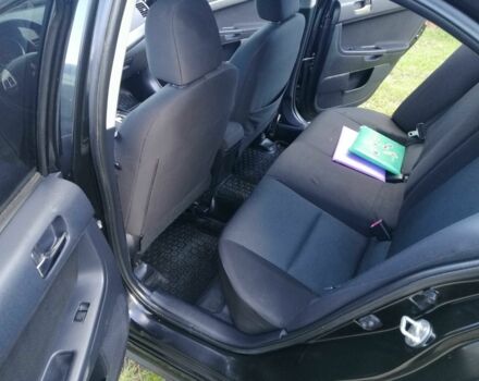 Міцубісі Lancer 2008 у Києві на Automoto.ua Чорний Міцубісі Lancer, об'ємом двигуна 2 л та пробігом 196 тис. км за 5500 $, фото 15 на Automoto.ua