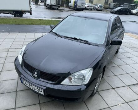 Черный Мицубиси Лансер, объемом двигателя 1.6 л и пробегом 226 тыс. км за 3750 $, фото 15 на Automoto.ua