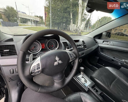 Чорний Міцубісі Lancer, об'ємом двигуна 2 л та пробігом 200 тис. км за 6800 $, фото 6 на Automoto.ua