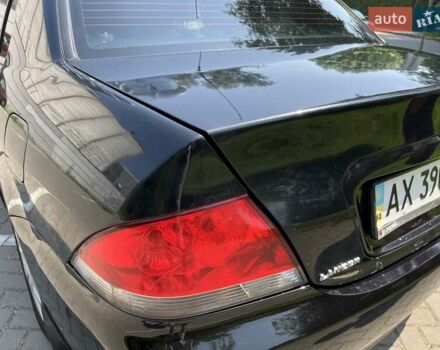 Чорний Міцубісі Lancer, об'ємом двигуна 1.6 л та пробігом 296 тис. км за 4200 $, фото 22 на Automoto.ua