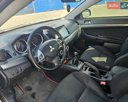 Чорний Міцубісі Lancer, об'ємом двигуна 2 л та пробігом 249 тис. км за 6500 $, фото 14 на Automoto.ua