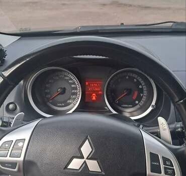 Черный Мицубиси Лансер, объемом двигателя 2 л и пробегом 211 тыс. км за 6900 $, фото 10 на Automoto.ua