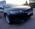 Чорний Міцубісі Lancer, об'ємом двигуна 2 л та пробігом 170 тис. км за 7600 $, фото 1 на Automoto.ua