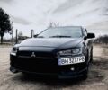 Черный Мицубиси Лансер, объемом двигателя 2 л и пробегом 140 тыс. км за 7200 $, фото 1 на Automoto.ua