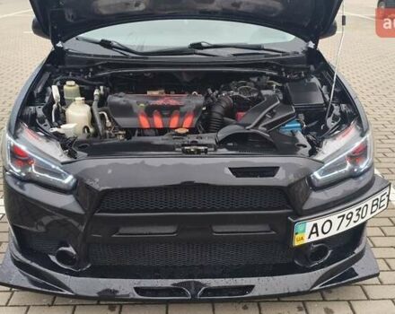 Чорний Міцубісі Lancer, об'ємом двигуна 2 л та пробігом 160 тис. км за 8000 $, фото 3 на Automoto.ua
