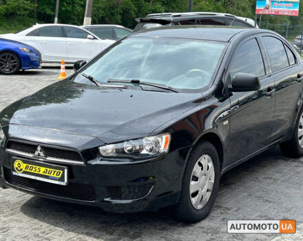 Черный Мицубиси Лансер, объемом двигателя 1.5 л и пробегом 93 тыс. км за 7000 $, фото 2 на Automoto.ua
