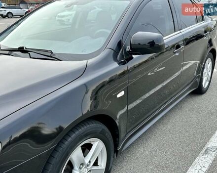 Чорний Міцубісі Lancer, об'ємом двигуна 2 л та пробігом 199 тис. км за 7900 $, фото 3 на Automoto.ua