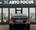 Чорний Міцубісі Lancer, об'ємом двигуна 1.6 л та пробігом 340 тис. км за 6190 $, фото 6 на Automoto.ua