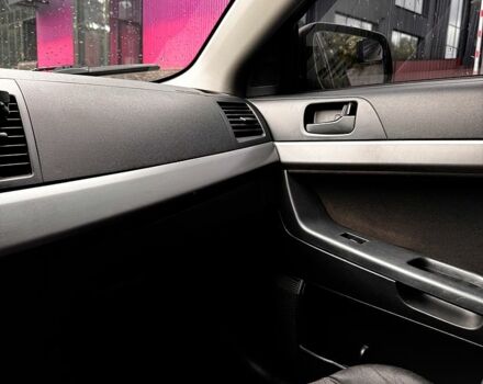 Черный Мицубиси Лансер, объемом двигателя 1.5 л и пробегом 250 тыс. км за 6700 $, фото 6 на Automoto.ua