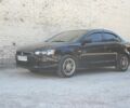Чорний Міцубісі Lancer, об'ємом двигуна 1.5 л та пробігом 110 тис. км за 6950 $, фото 7 на Automoto.ua