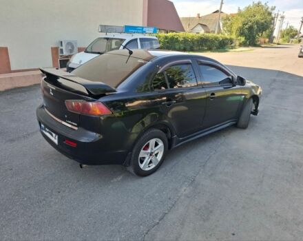 Чорний Міцубісі Lancer, об'ємом двигуна 2 л та пробігом 230 тис. км за 6650 $, фото 4 на Automoto.ua