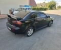 Чорний Міцубісі Lancer, об'ємом двигуна 2 л та пробігом 230 тис. км за 6650 $, фото 4 на Automoto.ua