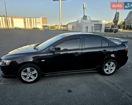 Чорний Міцубісі Lancer, об'ємом двигуна 2 л та пробігом 249 тис. км за 6500 $, фото 9 на Automoto.ua