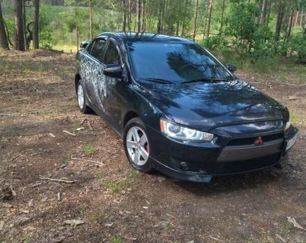 Чорний Міцубісі Lancer, об'ємом двигуна 2 л та пробігом 150 тис. км за 7600 $, фото 9 на Automoto.ua