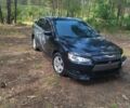 Чорний Міцубісі Lancer, об'ємом двигуна 2 л та пробігом 150 тис. км за 7600 $, фото 9 на Automoto.ua