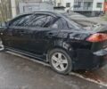 Чорний Міцубісі Lancer, об'ємом двигуна 2 л та пробігом 302 тис. км за 7200 $, фото 2 на Automoto.ua