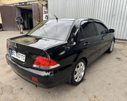 Мицубиси Лансер 2008 в Харькове на Automoto.ua Черный Мицубиси Лансер, объемом двигателя 1.6 л и пробегом 245 тыс. км за 4300 $, фото 2 на Automoto.ua