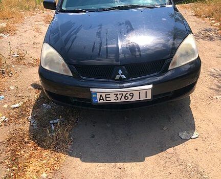 Чорний Міцубісі Lancer, об'ємом двигуна 1.6 л та пробігом 245 тис. км за 3200 $, фото 3 на Automoto.ua
