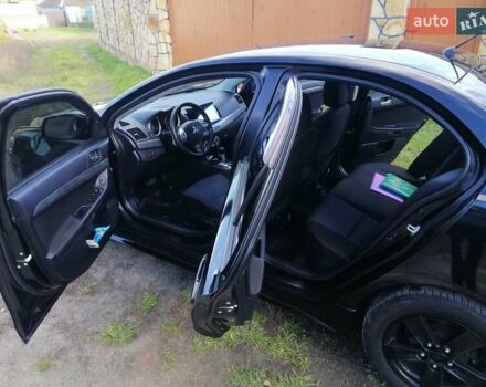 Мицубиси Лансер 2008 в Киеве на Automoto.ua Черный Мицубиси Лансер, объемом двигателя 2 л и пробегом 196 тыс. км за 5500 $, фото 20 на Automoto.ua