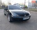 Чорний Міцубісі Lancer, об'ємом двигуна 1.58 л та пробігом 286 тис. км за 4950 $, фото 1 на Automoto.ua