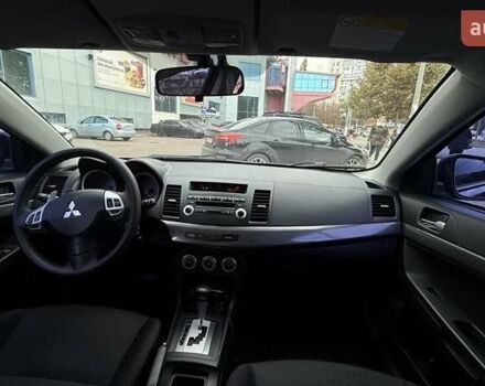 Черный Мицубиси Лансер, объемом двигателя 2 л и пробегом 222 тыс. км за 6000 $, фото 1 на Automoto.ua