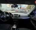 Черный Мицубиси Лансер, объемом двигателя 2 л и пробегом 222 тыс. км за 6000 $, фото 1 на Automoto.ua