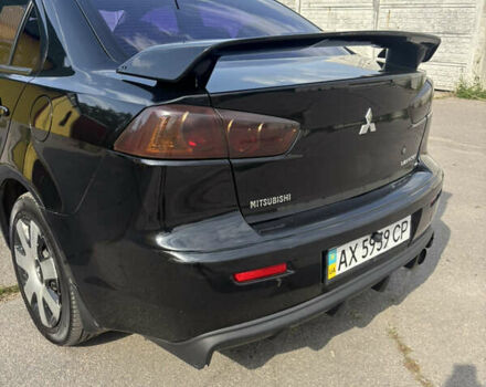 Чорний Міцубісі Lancer, об'ємом двигуна 1.5 л та пробігом 210 тис. км за 5500 $, фото 7 на Automoto.ua