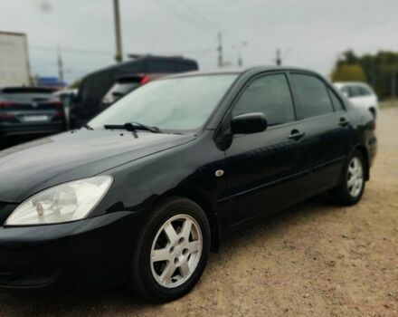 Чорний Міцубісі Lancer, об'ємом двигуна 1.6 л та пробігом 257 тис. км за 4200 $, фото 2 на Automoto.ua