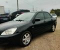 Чорний Міцубісі Lancer, об'ємом двигуна 1.6 л та пробігом 257 тис. км за 4200 $, фото 2 на Automoto.ua