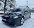 Чорний Міцубісі Lancer, об'ємом двигуна 2 л та пробігом 180 тис. км за 6999 $, фото 1 на Automoto.ua