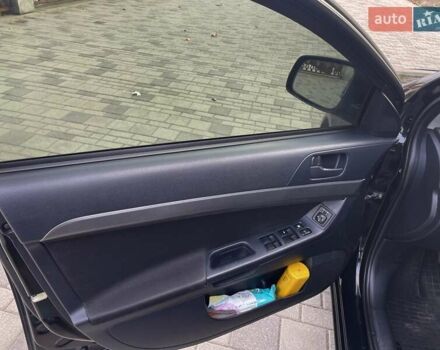 Чорний Міцубісі Lancer, об'ємом двигуна 1.5 л та пробігом 184 тис. км за 6000 $, фото 7 на Automoto.ua