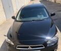 Чорний Міцубісі Lancer, об'ємом двигуна 2 л та пробігом 178 тис. км за 7500 $, фото 1 на Automoto.ua