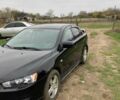 Чорний Міцубісі Lancer, об'ємом двигуна 2 л та пробігом 180 тис. км за 7500 $, фото 4 на Automoto.ua