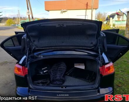 Черный Мицубиси Лансер, объемом двигателя 2 л и пробегом 196 тыс. км за 5500 $, фото 7 на Automoto.ua