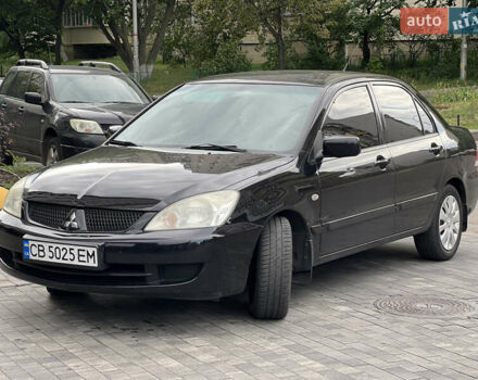 Черный Мицубиси Лансер, объемом двигателя 1.6 л и пробегом 167 тыс. км за 4850 $, фото 7 на Automoto.ua