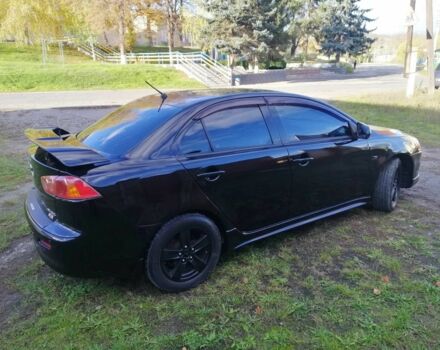 Міцубісі Lancer 2008 у Києві на Automoto.ua Чорний Міцубісі Lancer, об'ємом двигуна 2 л та пробігом 196 тис. км за 5500 $, фото 1 на Automoto.ua
