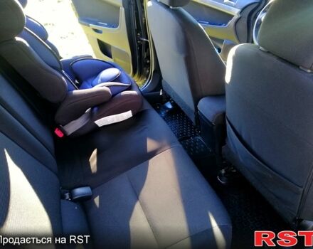 Черный Мицубиси Лансер, объемом двигателя 2 л и пробегом 196 тыс. км за 5500 $, фото 11 на Automoto.ua