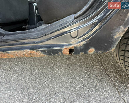 Черный Мицубиси Лансер, объемом двигателя 1.6 л и пробегом 321 тыс. км за 5000 $, фото 38 на Automoto.ua