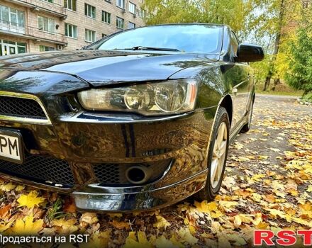 Чорний Міцубісі Lancer, об'ємом двигуна 2 л та пробігом 245 тис. км за 5500 $, фото 1 на Automoto.ua