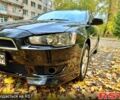 Чорний Міцубісі Lancer, об'ємом двигуна 2 л та пробігом 245 тис. км за 5500 $, фото 1 на Automoto.ua